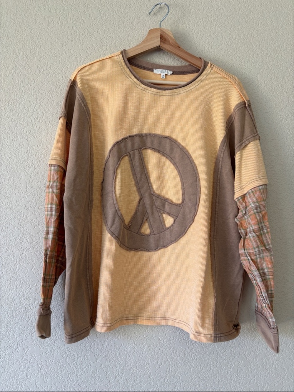 Easel Peace Patch Top With Peace Sign Graphic and Plaid Sleeves